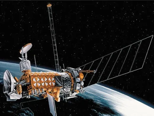 A Defense Meteorological Satellite Program (DMSP) satellite orbits Earth