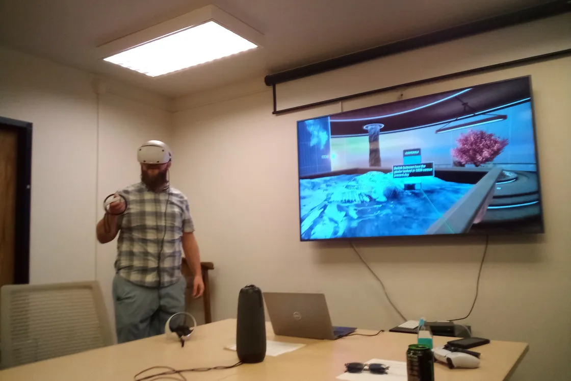 Photo of NSIDCer Trey Stafford testing Climate Station