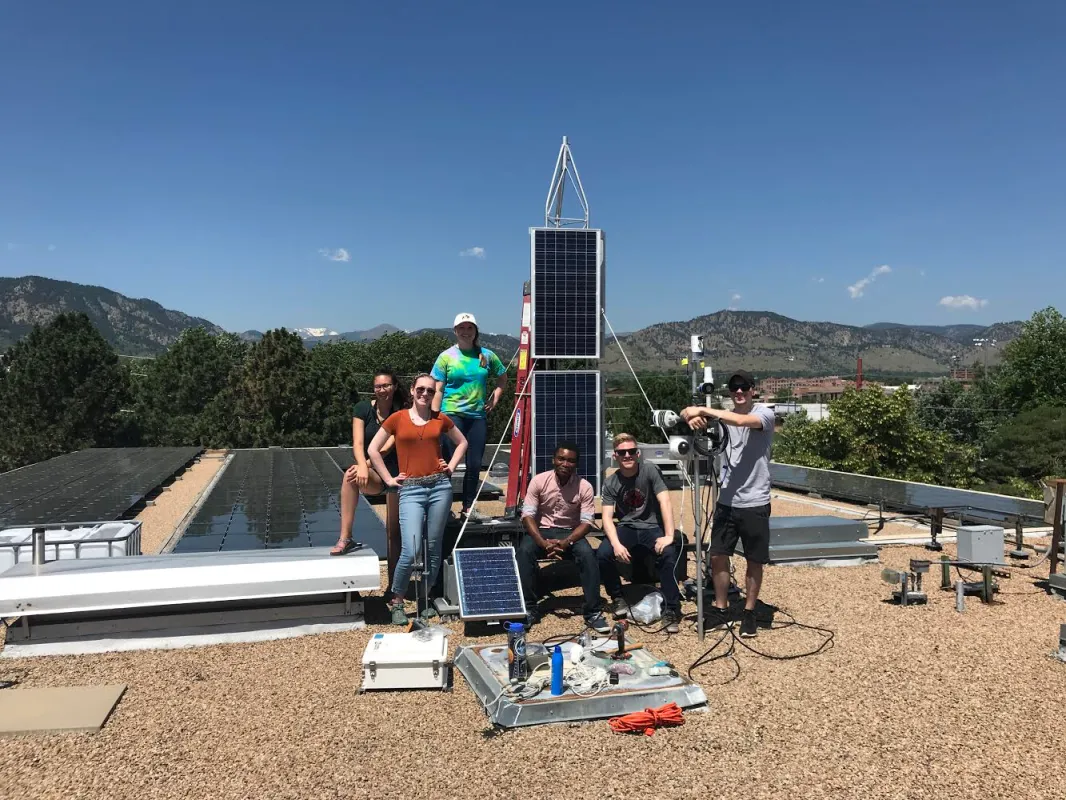 Team JANE assembled the AMIGOS towers on the top of the NSIDC building in Boulder, Colorado, so they could test it undisturbed. From left to right: Skylar Edwards, Raymie Fotherby, Emma Tomlinson, Coovi Meha, Ryan Weatherbee, and Jack Soltys.